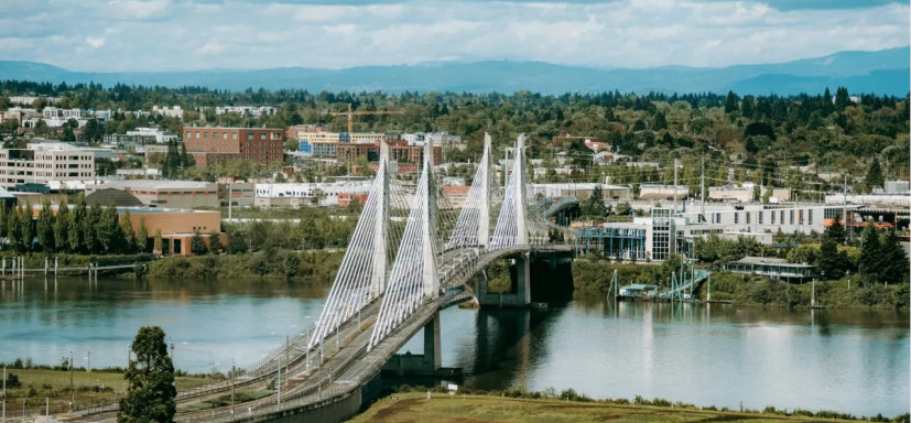 iew of Portland’s Tilikum Crossing and skyline