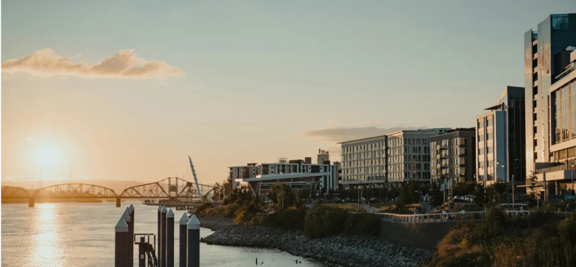 Vancouver waterfront at sunset with city buildings